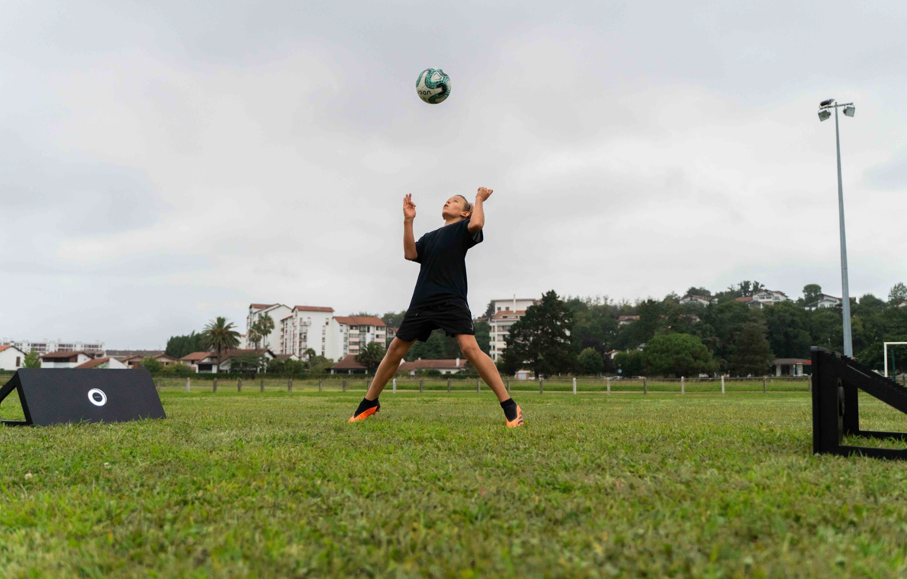 Aerial ball control while training with Voon Soccer smart rebounders