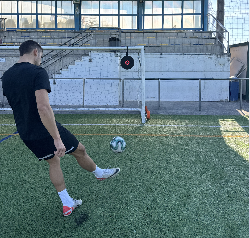 Two players training with the Voon Soccer smart rebounders and having fun.
