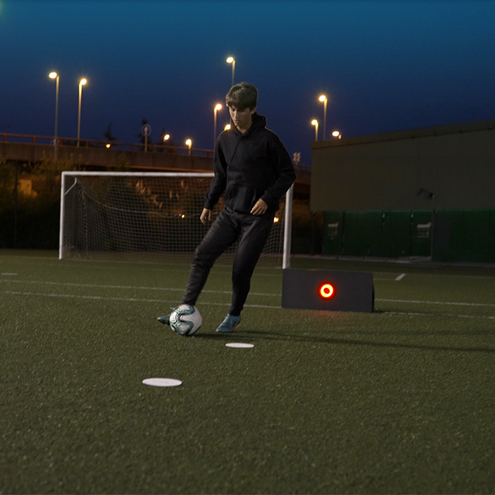 Player improving his game with the voon soccer smart rebounder working on his dribbling